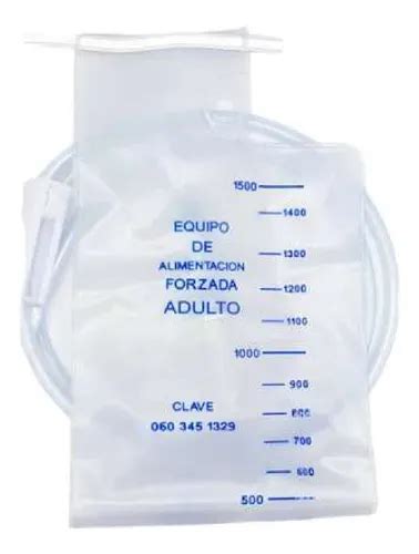 Fotografía: Conexión del tubo de la bolsa de alimentación al adaptador de botón de la sonda.