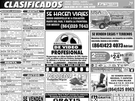 Foto de un periódico con un anuncio clasificado enmarcado