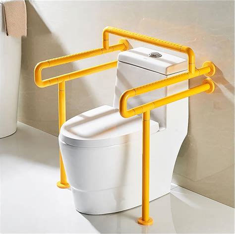 Diseño de inodoro accesible con barras de apoyo y espacio de transferencia