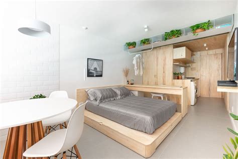 foto de interior de departamento con cocina americana y dormitorio amoblado