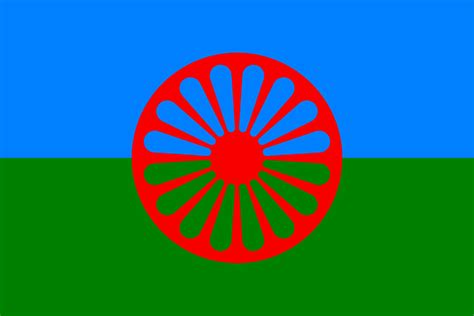 Bandera gitana con cielo azul, campo verde y una rueda roja