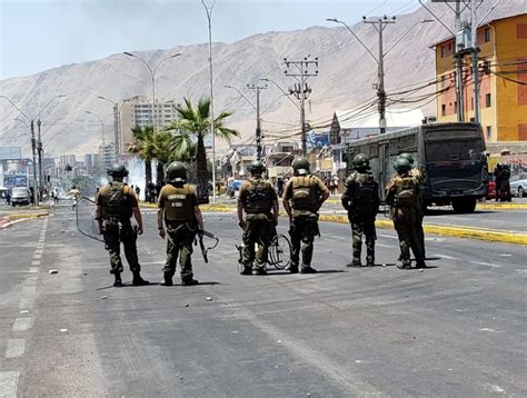 Fotografía de manifestantes y enfrentamientos con Carabineros en Concepción, 2019