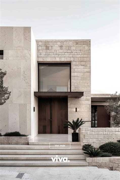 Fachada moderna de una de las residencias Villa Soleares rodeada de jardines