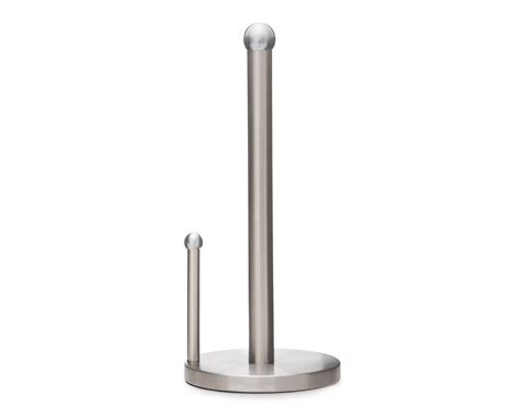 Detalle técnico de un portarrollos de acero inoxidable montado a la altura ergonómica correcta