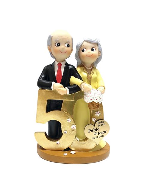 Figura de tarta de bodas de oro con pareja de ancianos