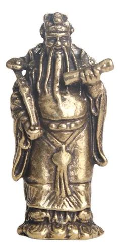 Estatuas de Fu Lu Shou en un escritorio de oficina