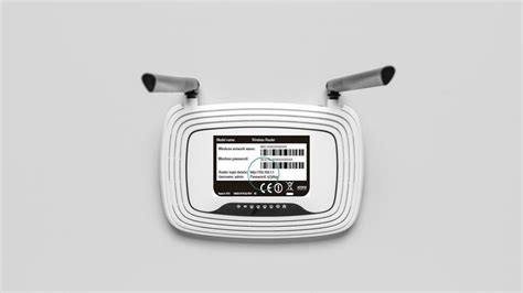 Etiqueta trasera de un router Linksys WAP300N mostrando las credenciales predeterminadas