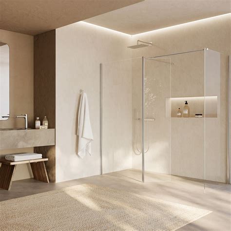 Diseño de baño moderno con cabina de ducha y accesorios de seguridad para adultos mayores